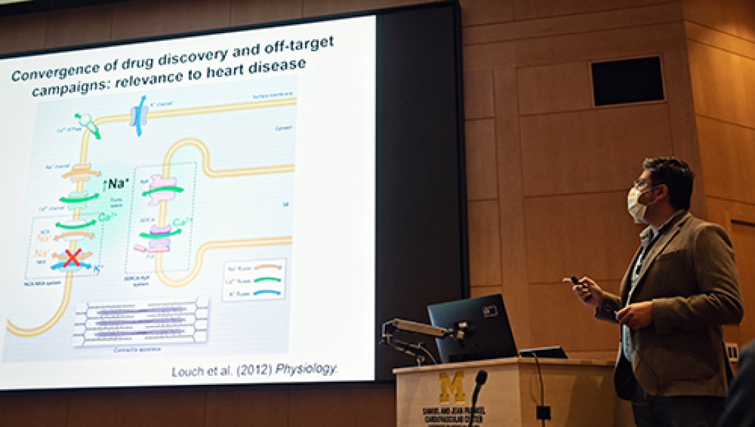 A speaker wearing mask presenting at the Annual M-BoCA Symposium