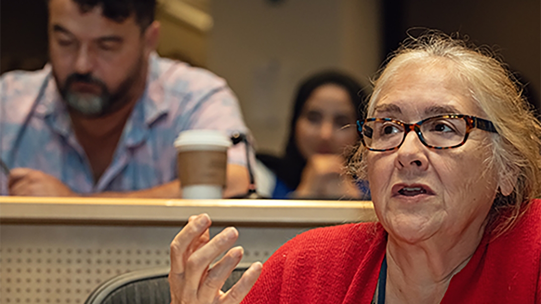 A woman trying to make a point during Annual M-BoCA Symposium