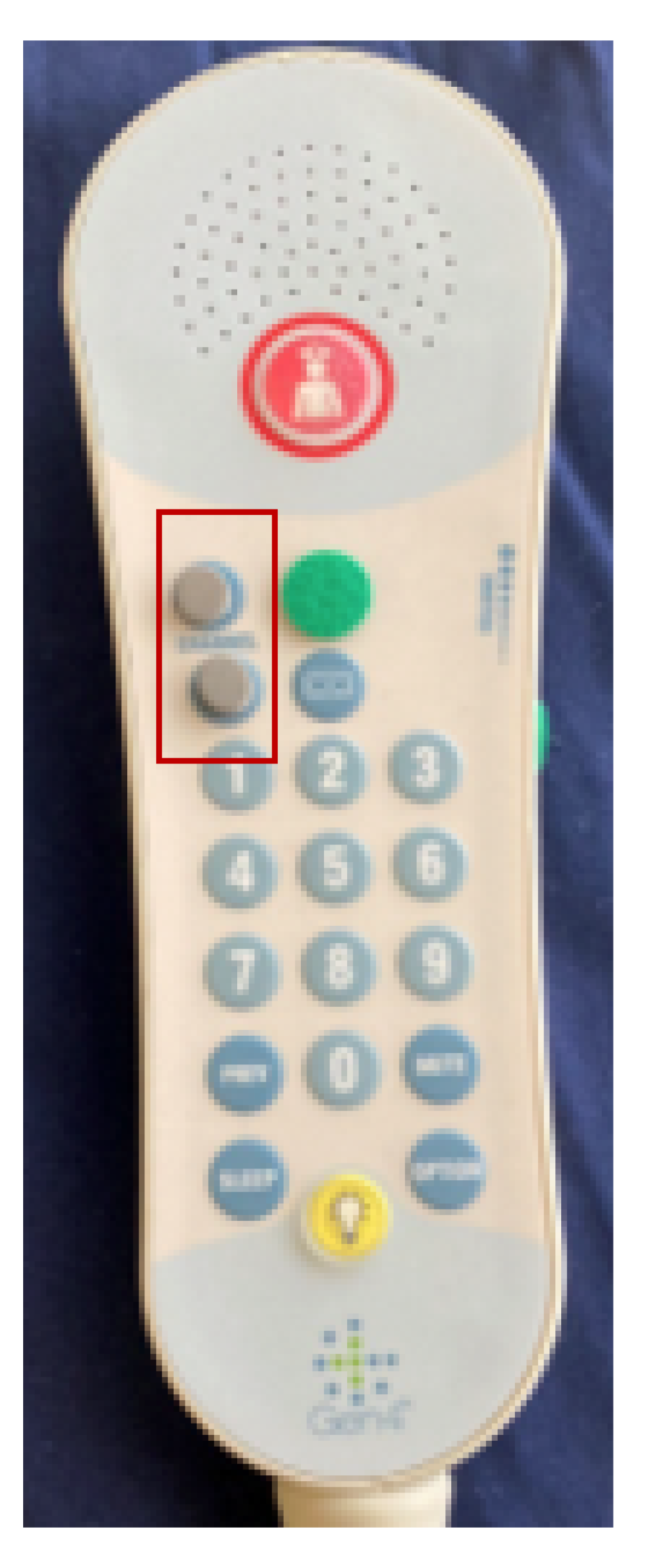 photo of where to place raised dots on patient's controller with red box over channel buttons